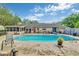 The refreshing blue pool and patio make this backyard the perfect place for summer fun at 2704 Burgoyne Pl, Deland, FL 32720