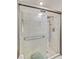 Walk-in shower with modern fixtures and glass enclosure, providing a clean and contemporary look at 2704 Burgoyne Pl, Deland, FL 32720