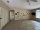 Living room featuring neutral walls, tile flooring, and a closet at 288 Mcmillon Dr, Orange City, FL 32763