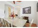 Dining room with a view towards the living room, creating an open space at 2940 Se 23Rd Ave, Ocala, FL 34471