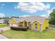 Charming single-Gathering home with a three-car garage, well-manicured lawn and brick-paved driveway at 2940 Se 23Rd Ave, Ocala, FL 34471