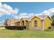 Charming single-story home with a two-car garage, brick accents and manicured lawn at 2940 Se 23Rd Ave, Ocala, FL 34471