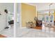 Open-concept living room featuring tile floors and tall ceilings at 2940 Se 23Rd Ave, Ocala, FL 34471
