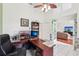 Large home office featuring built in storage and work space with a view into the living room at 2940 Se 23Rd Ave, Ocala, FL 34471