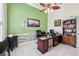Spacious office area with a large desk, comfortable chair, and decorative shelving at 2940 Se 23Rd Ave, Ocala, FL 34471