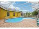 A backyard pool and outdoor living space, perfect for cooling off and enjoying the outdoors at 2940 Se 23Rd Ave, Ocala, FL 34471