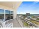 Condo balcony overlooking the city, offering beautiful views of the surrounding area and water at 2967 S Atlantic Ave # 1601, Daytona Beach Shores, FL 32118