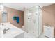 Bathroom featuring a glass-enclosed shower and double vanity at 2967 S Atlantic Ave # 1601, Daytona Beach Shores, FL 32118