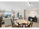Open concept living and dining area with water views from floor to ceiling windows at 2967 S Atlantic Ave # 1601, Daytona Beach Shores, FL 32118