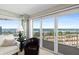Bright and airy living space with expansive windows showcasing stunning waterfront and city views at 2967 S Atlantic Ave # 1601, Daytona Beach Shores, FL 32118