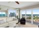 Comfortable living room with ocean views from large windows, blending interior comfort with scenic beauty at 2967 S Atlantic Ave # 1601, Daytona Beach Shores, FL 32118