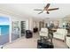 Open living area with a balcony overlooking the ocean, offering stunning views and seamless indoor-outdoor living at 2967 S Atlantic Ave # 1601, Daytona Beach Shores, FL 32118