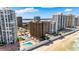 Stunning aerial perspective highlighting beachfront condos and private pools along the picturesque coastline at 3023 S Atlantic Ave # 4020, Daytona Beach, FL 32118