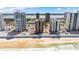 Beautiful aerial view showcasing beachfront condos, private pool, and ocean access on a sunny day at 3023 S Atlantic Ave # 4020, Daytona Beach, FL 32118