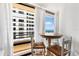 Cozy breakfast nook on the balcony with a small table and chairs, offering beautiful ocean views at 3023 S Atlantic Ave # 4020, Daytona Beach, FL 32118