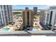 Exterior of a beachfront condo featuring a pool deck, parking, and easy access to the sandy beach at 3023 S Atlantic Ave # 4020, Daytona Beach, FL 32118