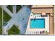 Aerial view of the pristine pool area, complete with lounging chairs and tables for ultimate relaxation at 3023 S Atlantic Ave # 4020, Daytona Beach, FL 32118