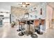 Stylish bar area with seating and a unique brick wall design at 316 Nowell Loop, Deland, FL 32724