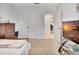 This bedroom has neutral carpet, closet, and doorway leading to other parts of the house at 316 Nowell Loop, Deland, FL 32724