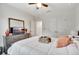 Cozy bedroom with a bed, dresser, and closet, offering ample storage and comfort at 316 Nowell Loop, Deland, FL 32724