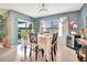 Dining area with tile flooring and sliding glass doors to the backyard at 316 Nowell Loop, Deland, FL 32724