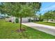 Attractive home featuring a two car garage and landscaped front yard at 316 Nowell Loop, Deland, FL 32724