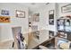 This office has a sleek black desk, plush seating, and unique wall art at 316 Nowell Loop, Deland, FL 32724