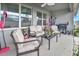 Cozy covered patio featuring outdoor furniture and grill for entertaining at 316 Nowell Loop, Deland, FL 32724