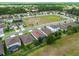 This aerial view shows the home's location in a neighborhood close to a green space and major roads at 343 Lazio Cir, Debary, FL 32713