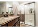 Bathroom boasting granite countertops, modern fixtures, and a glass-enclosed shower at 343 Lazio Cir, Debary, FL 32713