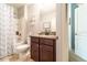 A bathroom features a vanity with granite countertops, updated fixtures, and a shower and tub combination at 343 Lazio Cir, Debary, FL 32713
