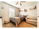 Bedroom with carpet, nice ceiling fan, and a love seat at 343 Lazio Cir, Debary, FL 32713