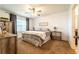 Cozy bedroom featuring natural light, neutral paint and a comfortable bed at 343 Lazio Cir, Debary, FL 32713