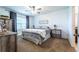 Cozy bedroom with plush carpeting, a ceiling fan, and a comfortable bed at 343 Lazio Cir, Debary, FL 32713