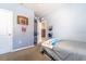 This bedroom features a view of the closet and a basketball hoop at 343 Lazio Cir, Debary, FL 32713