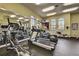 Well-equipped gym with treadmills, elliptical machines, and ample space for workouts at 343 Lazio Cir, Debary, FL 32713