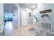 A view of the hallway showcases the floor and the connection to other rooms at 343 Lazio Cir, Debary, FL 32713