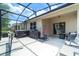 Covered patio with an outdoor grill, furniture and hammock, perfect for entertaining at 343 Lazio Cir, Debary, FL 32713