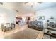 Spacious living area with tile floors, open layout, seamlessly connecting to the kitchen and dining spaces at 343 Lazio Cir, Debary, FL 32713