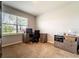 Office space with a large window and neutral tones perfect for a work space at 343 Lazio Cir, Debary, FL 32713