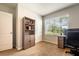 Cozy office space with great natural lighting and neutral carpet at 343 Lazio Cir, Debary, FL 32713