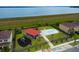 Community playground featuring splash pad, picnic pavilion, and fenced-in play area near the water at 343 Lazio Cir, Debary, FL 32713