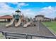 Community playground with slides and climbing structures for enjoyment at 343 Lazio Cir, Debary, FL 32713