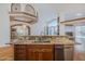 Bright kitchen with stainless appliances, granite countertops, and lots of open space at 3601 Galway Ln, Ormond Beach, FL 32174