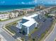 Great location with this aerial view of the building near the beach and highway at 3700 S Atlantic Ave # 413, New Smyrna Beach, FL 32169