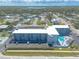 Stunning aerial view of this building with plenty of parking and easy highway access at 3700 S Atlantic Ave # 413, New Smyrna Beach, FL 32169