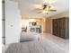 This bedroom features two beds, tile flooring, ceiling fan, and access to the kitchen and closet at 3700 S Atlantic Ave # 413, New Smyrna Beach, FL 32169