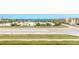 This exterior view shows the beachfront access and nearby street access and parking at 3700 S Atlantic Ave # 413, New Smyrna Beach, FL 32169