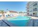 Relax by the sparkling community pool with ample lounge chairs and nearby beach access at 3700 S Atlantic Ave # 413, New Smyrna Beach, FL 32169