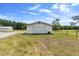 Spacious, well-maintained garage exterior with an extended lawn at 4145 Rambler Ave, St Cloud, FL 34772